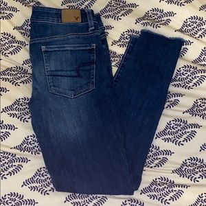 AE dark wash super stretch jegging